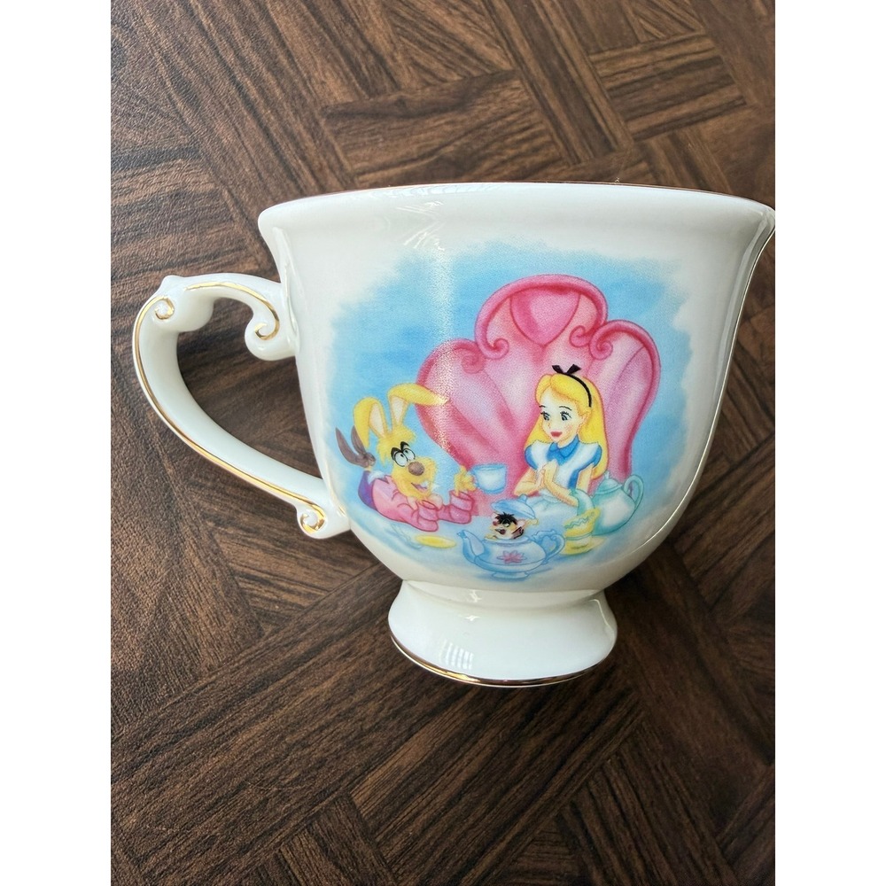 Disney Parks Alice in Wonderland Mad Tea Party Ceramic Teacup Gold Trim White